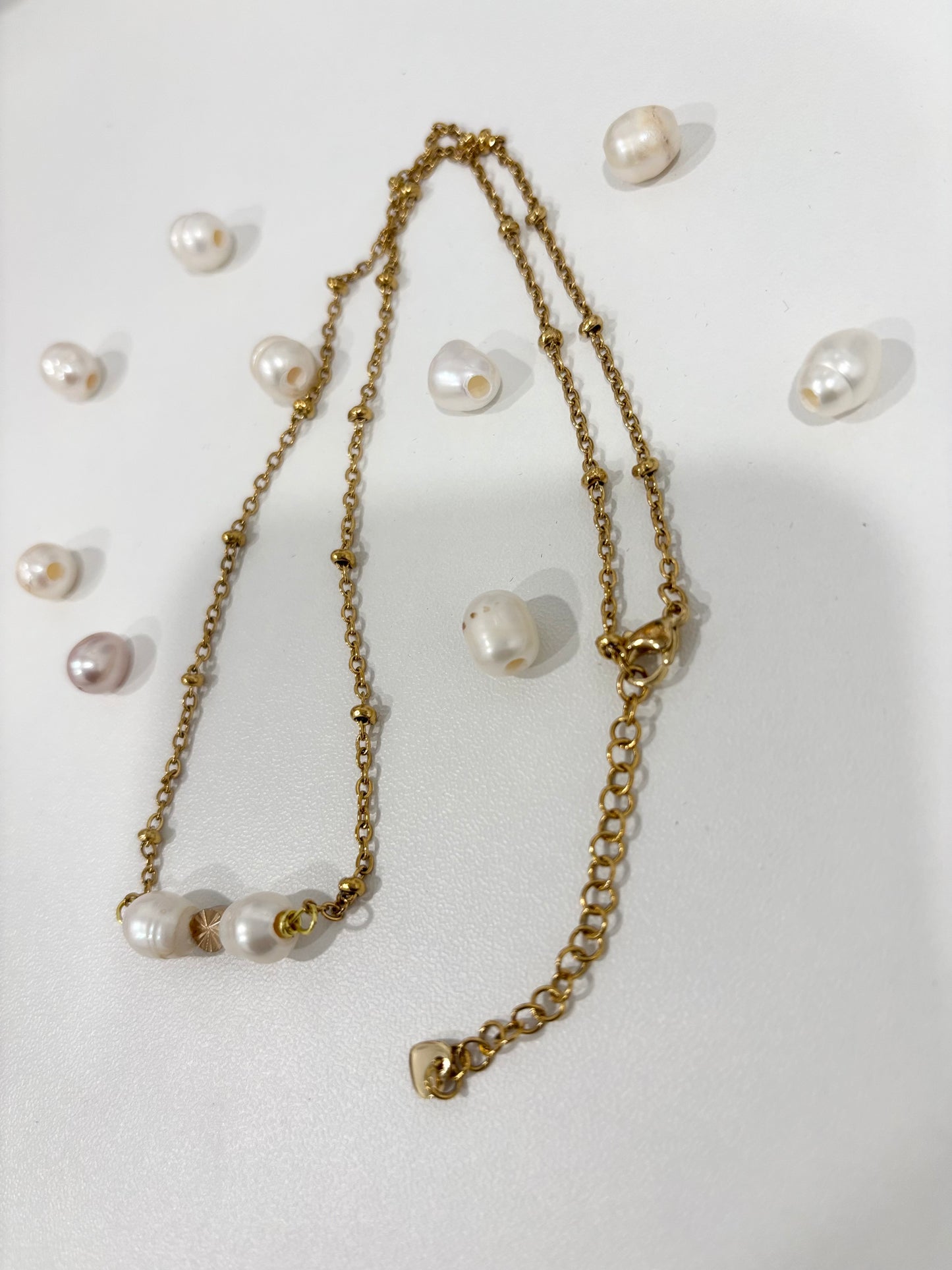 Cadena , perla preciosa